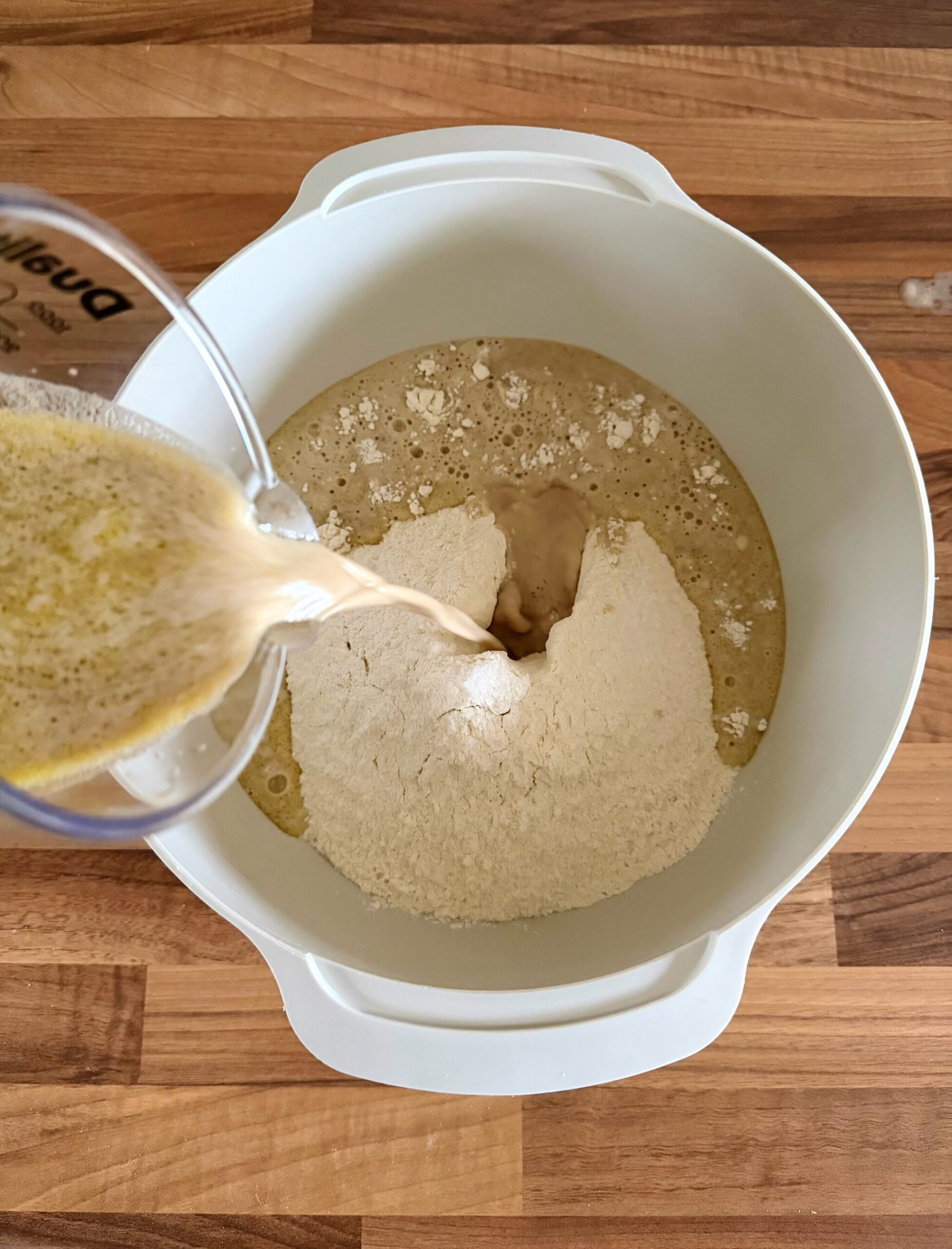 Pour the wet ingredients into the dry ingredients