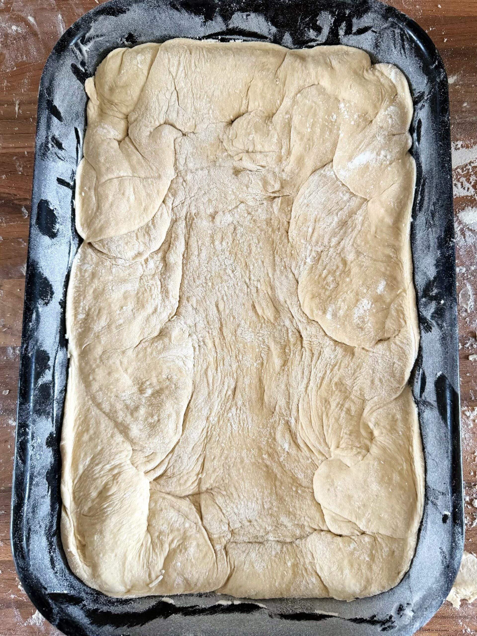 focaccia dough in tray