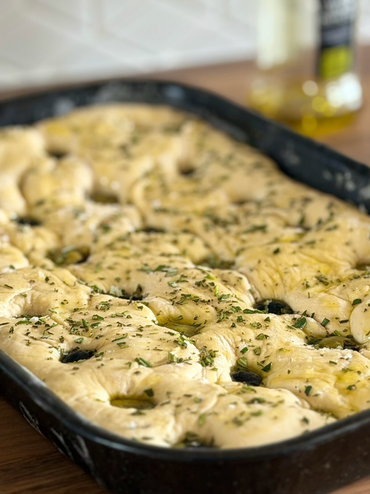 olives and rosemary in bread dough