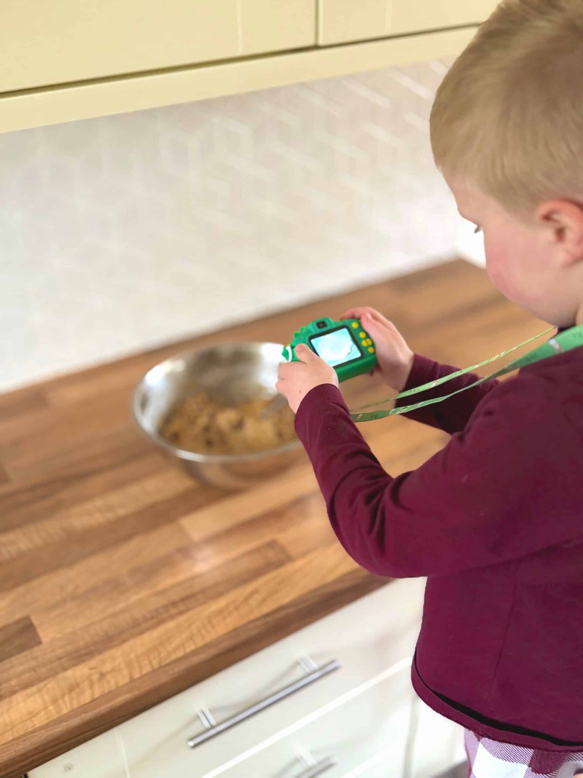 5 year old taking photo of food
