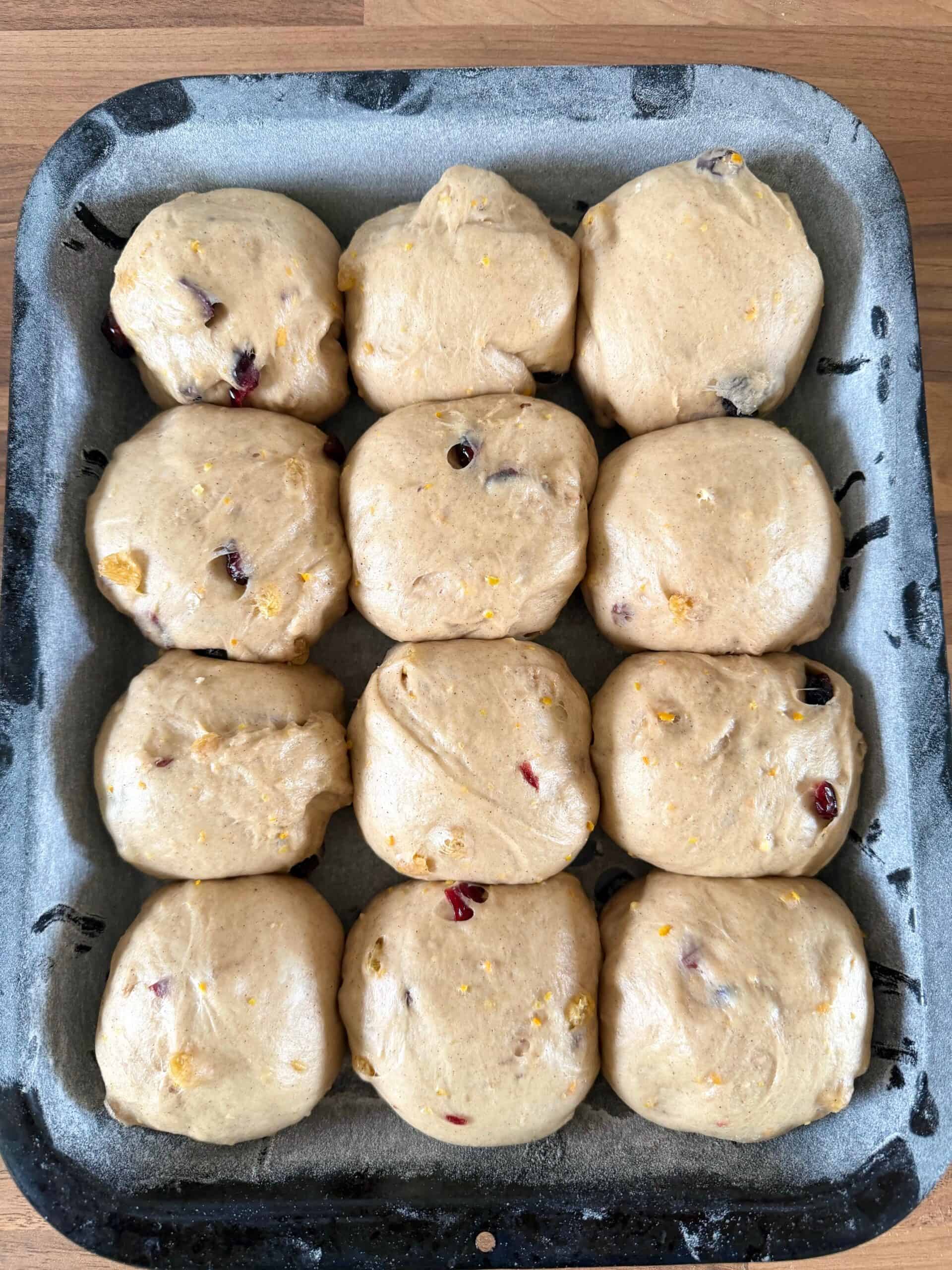 proved hot cross bun dough balls