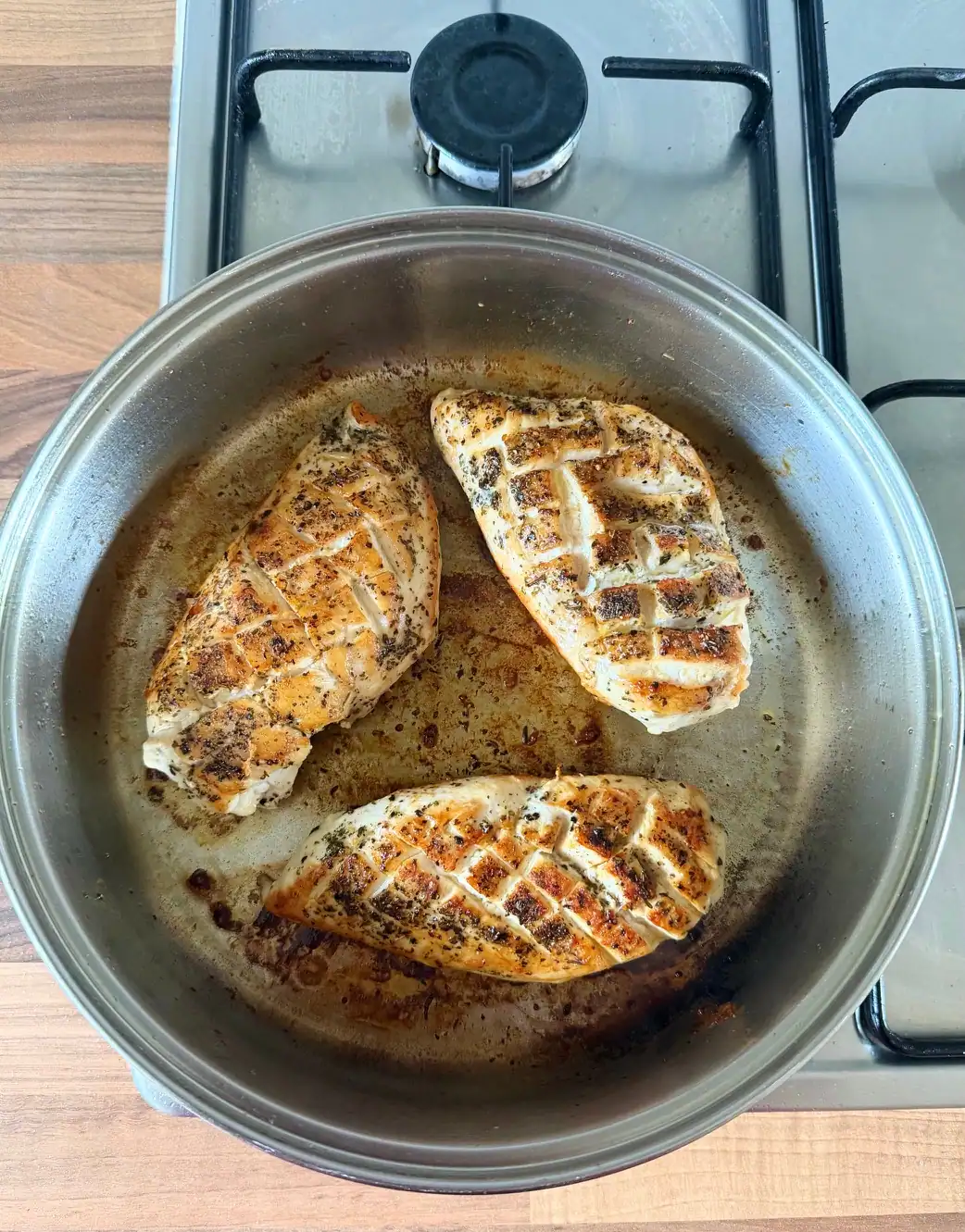 cooking chicken in a pan
