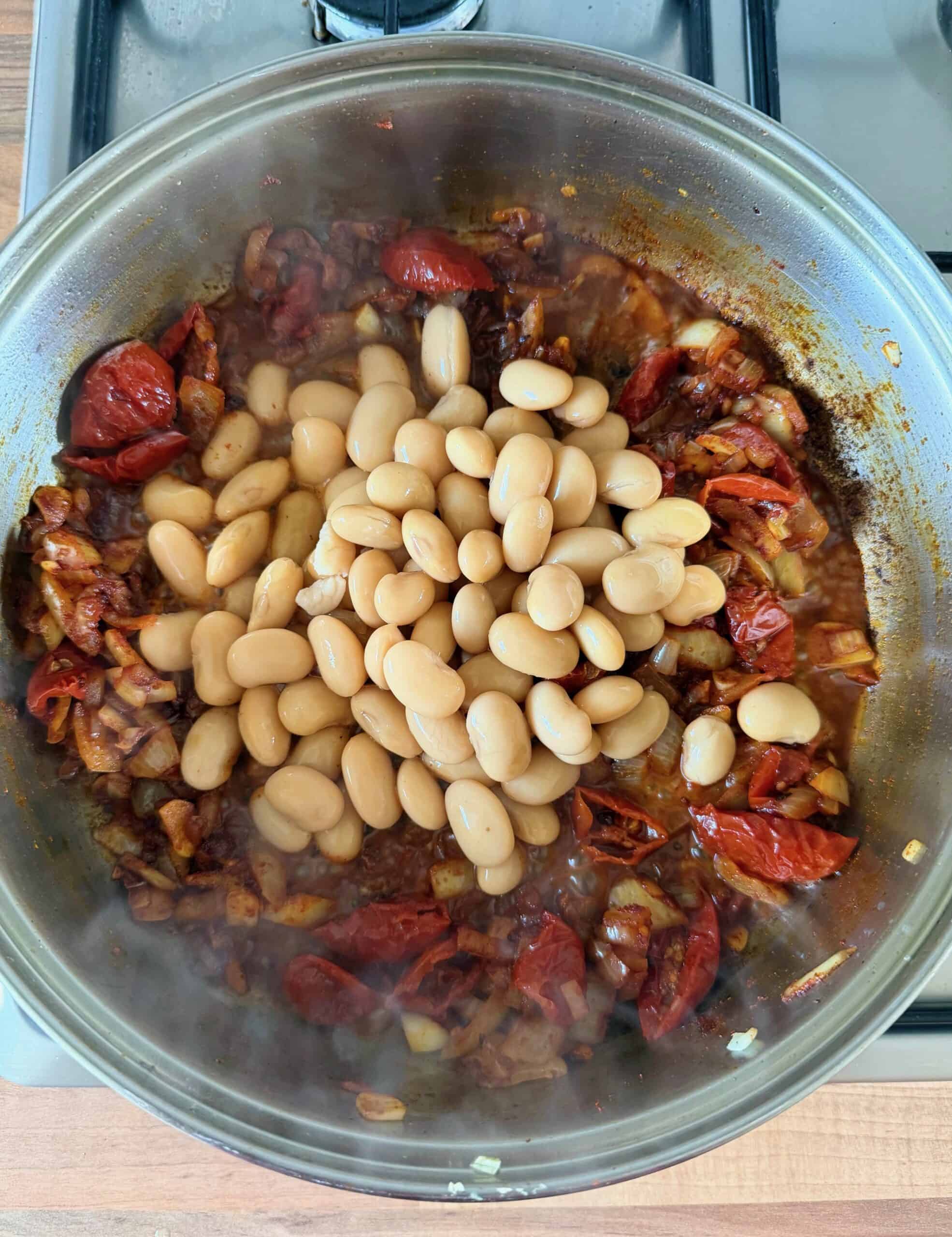 add butter beans into the pan