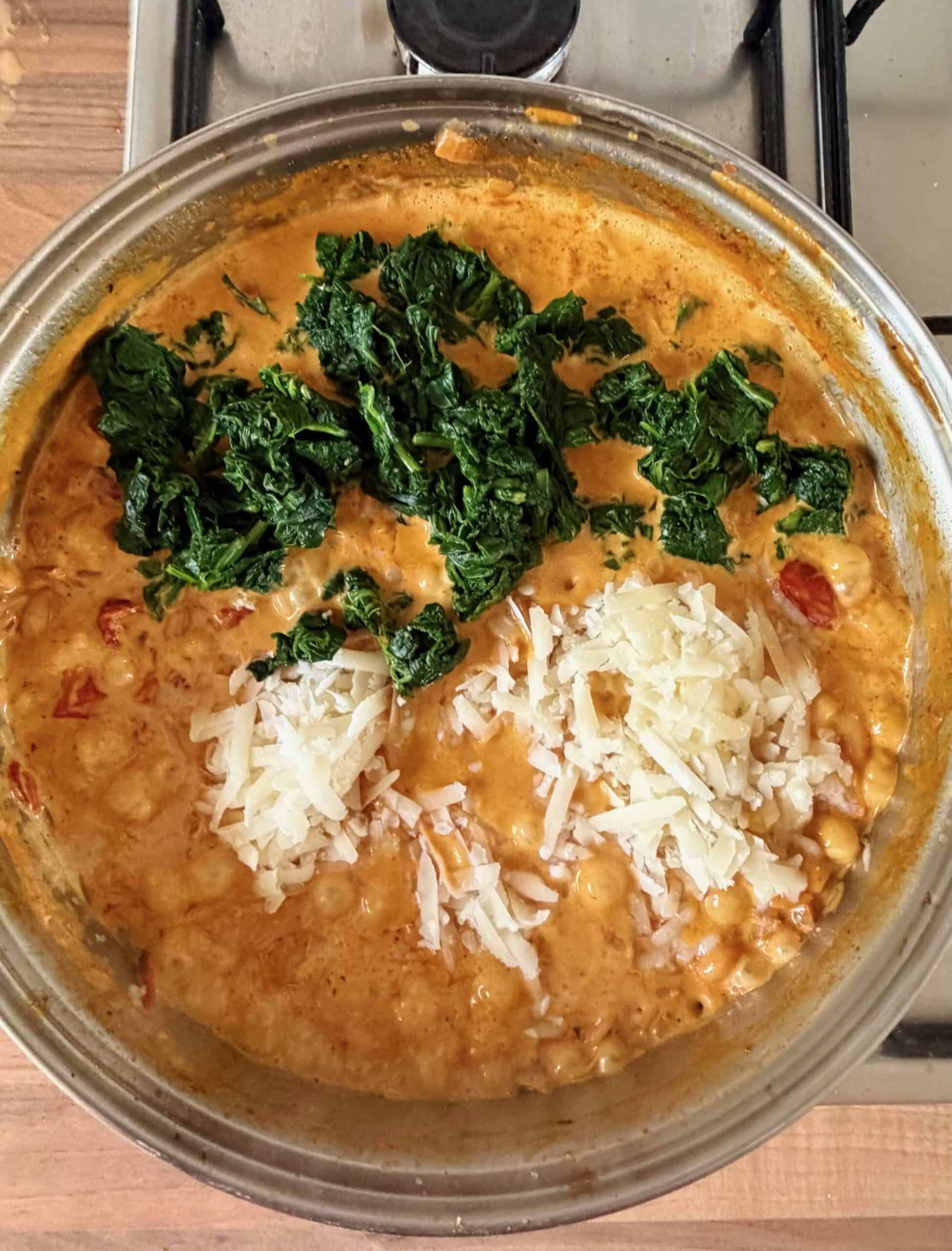 add spinach and parmesan to the pan