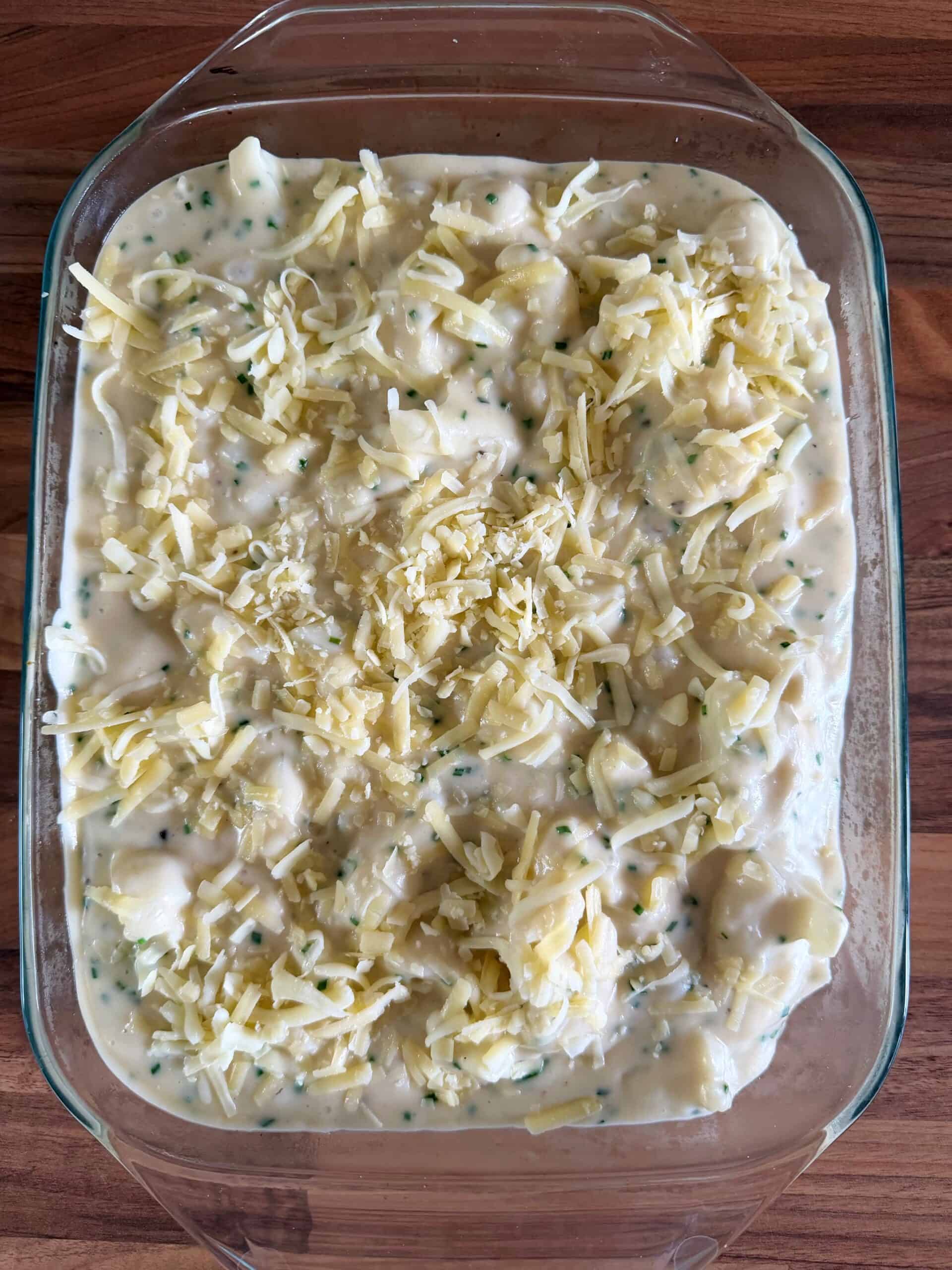 cauliflower cheese in a dish with cheese on top
