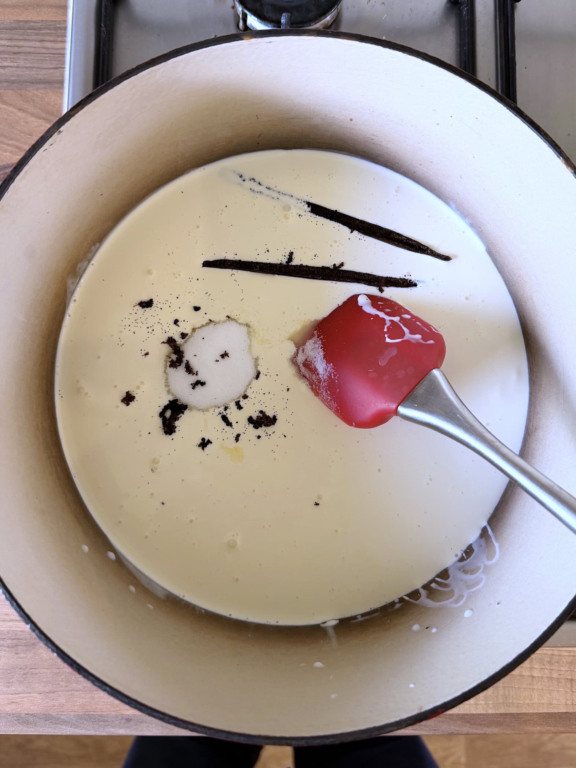 heating milk, cream, sugar and vanilla pod
