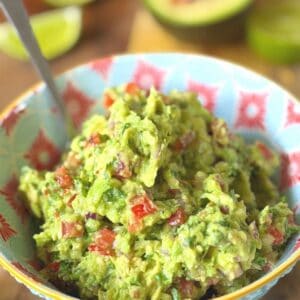 close up of guacamole in a colourful bowl