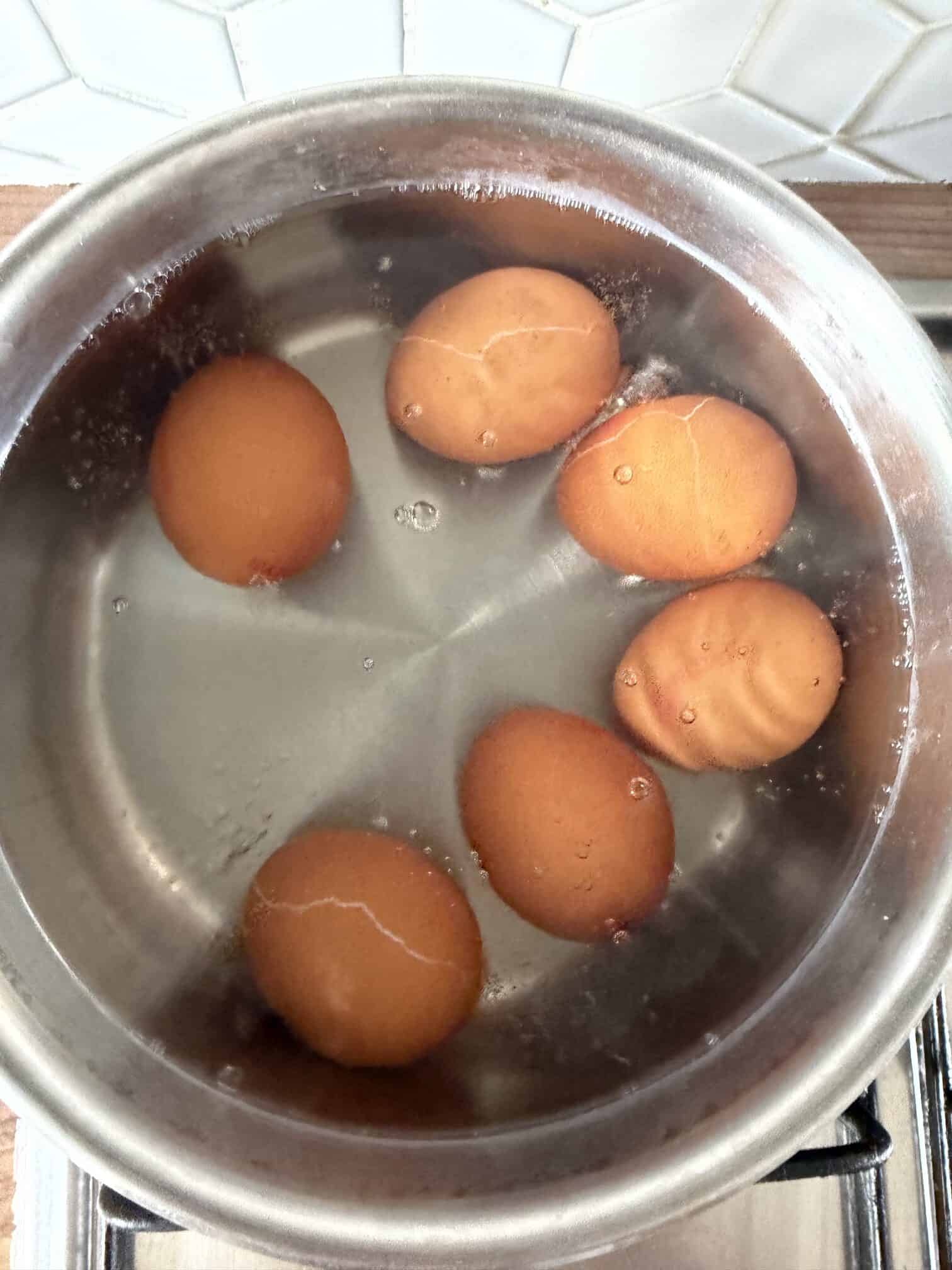 Boiling eggs in water