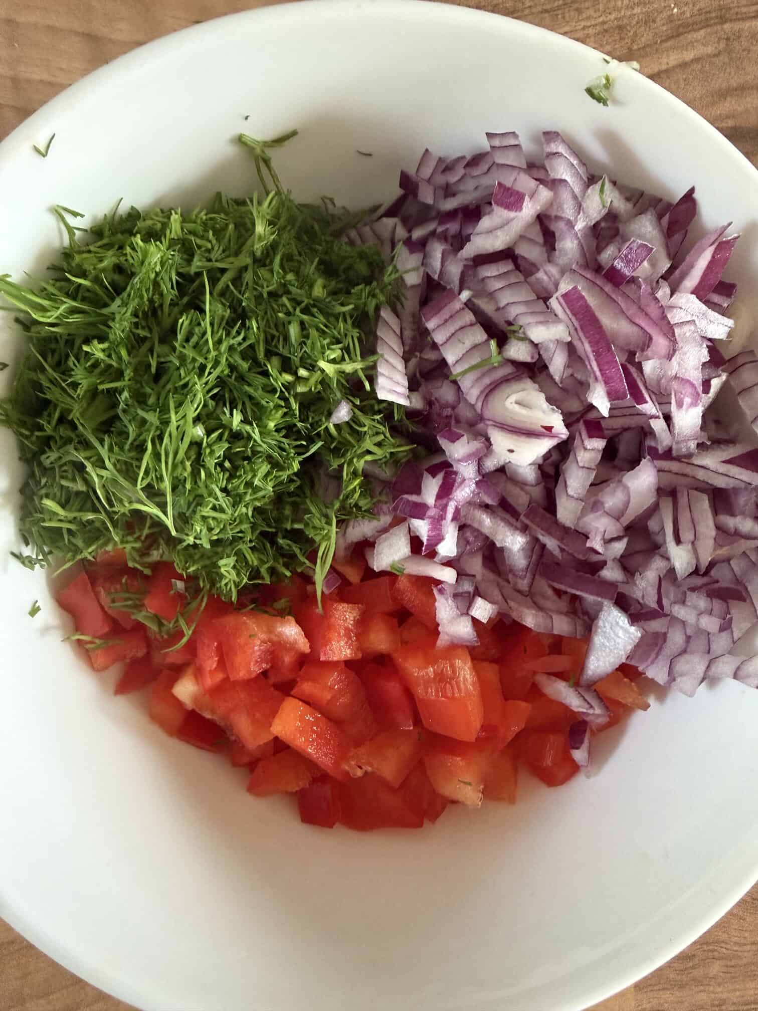 Diced onion, red pepper and dill