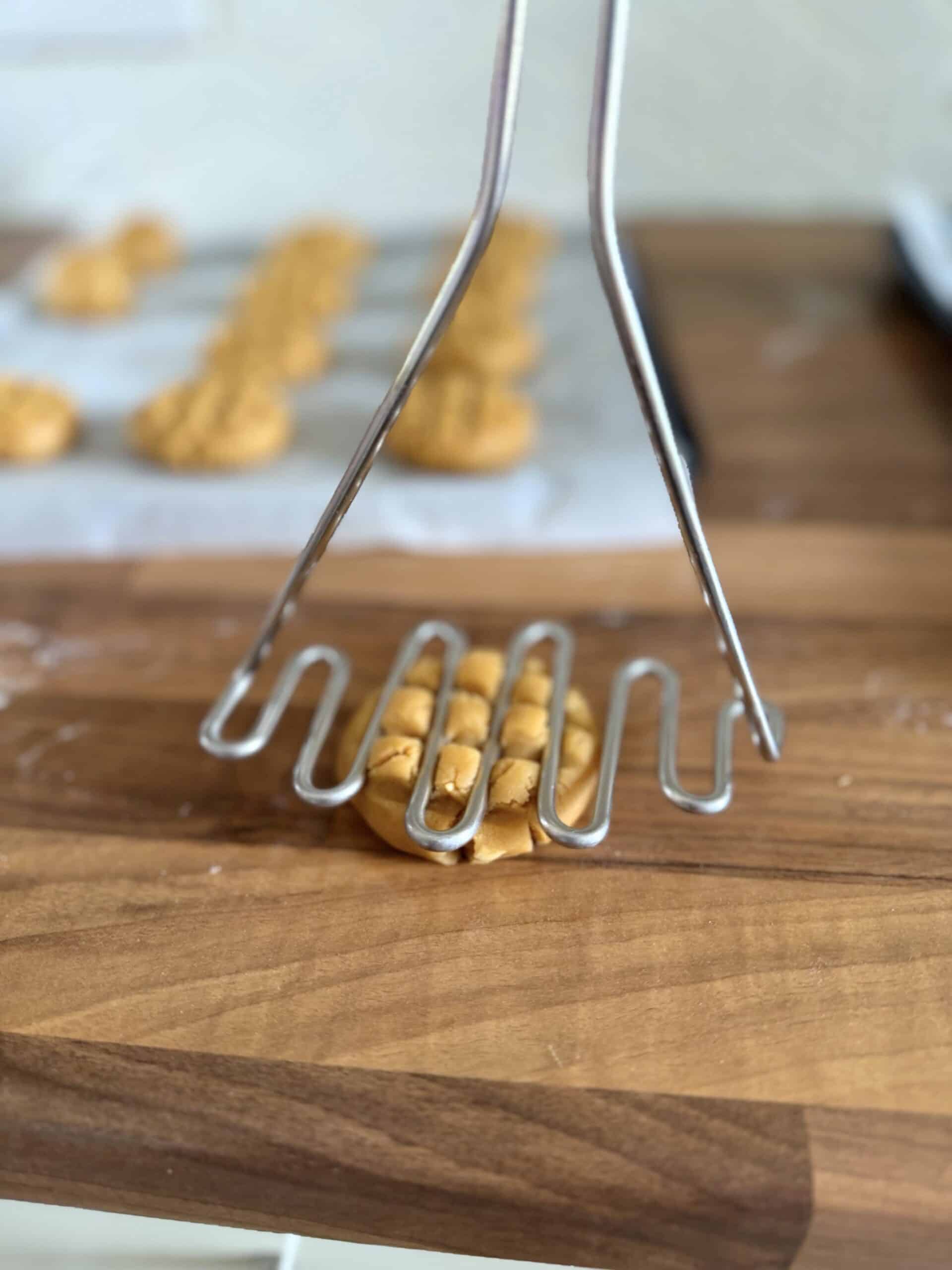 potato masher to flatten cookie dough