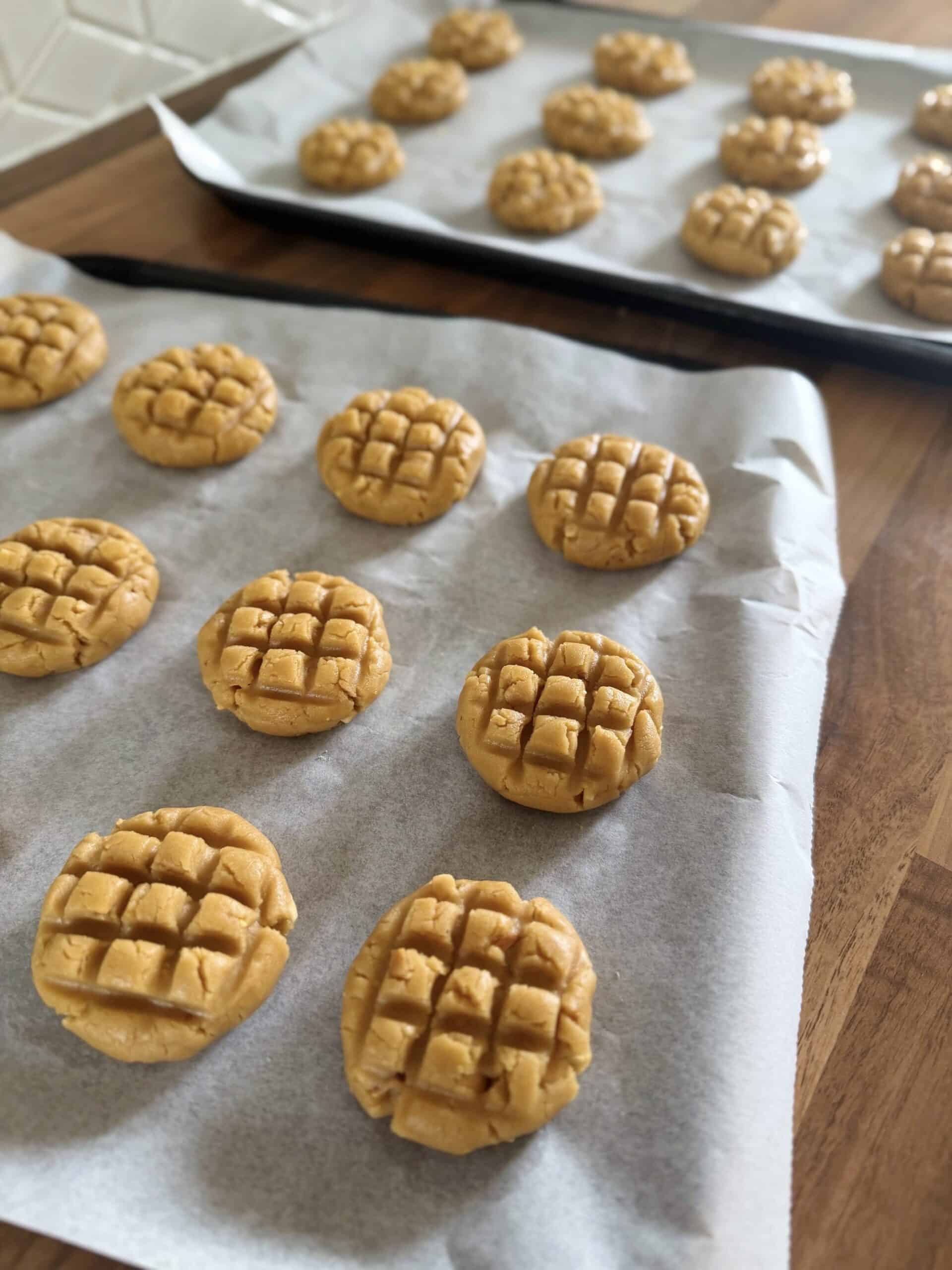 flattened cookie dough on baking tray
