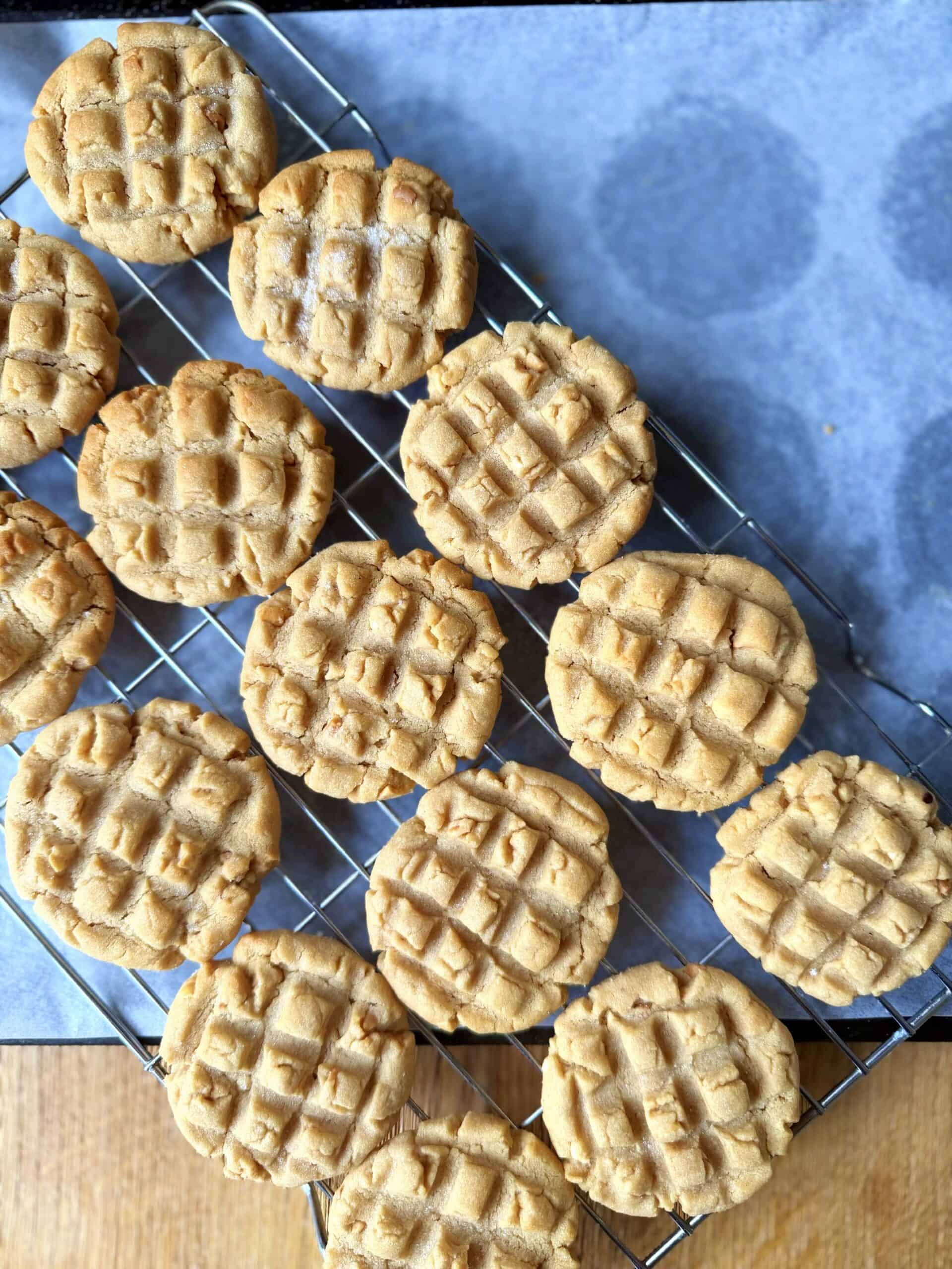 peanut butter cookies cooling on cooling rack
