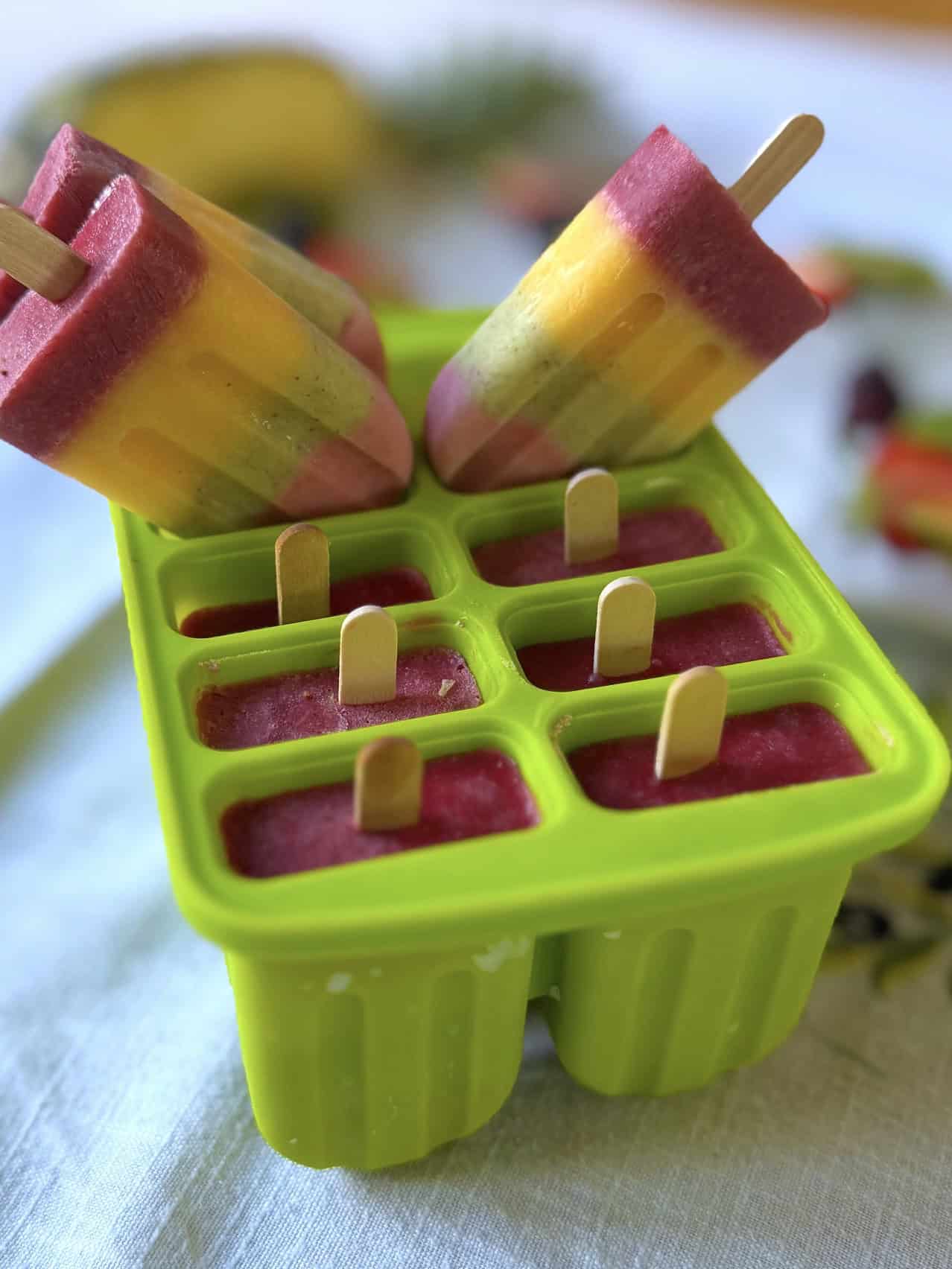 Rainbow popsicles in the ice lolly moulds