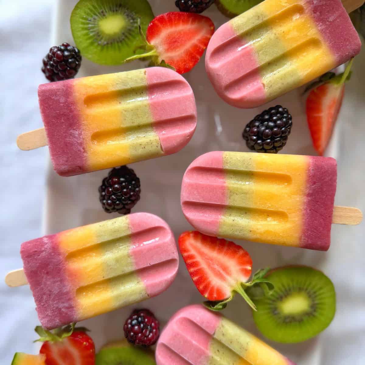 rainbow popsicle with fresh fruit and ice