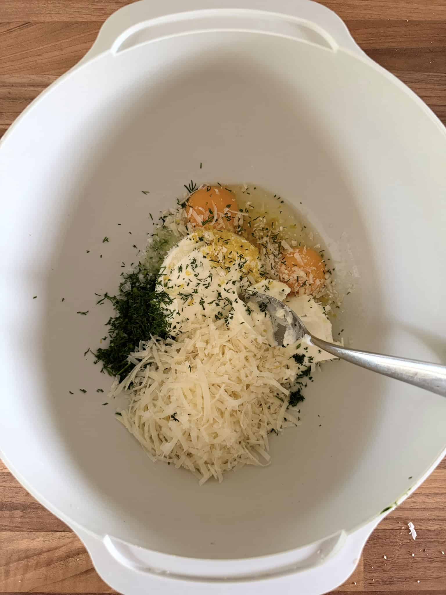 mix egg, parmesan, cream cheese and dill in a bowl