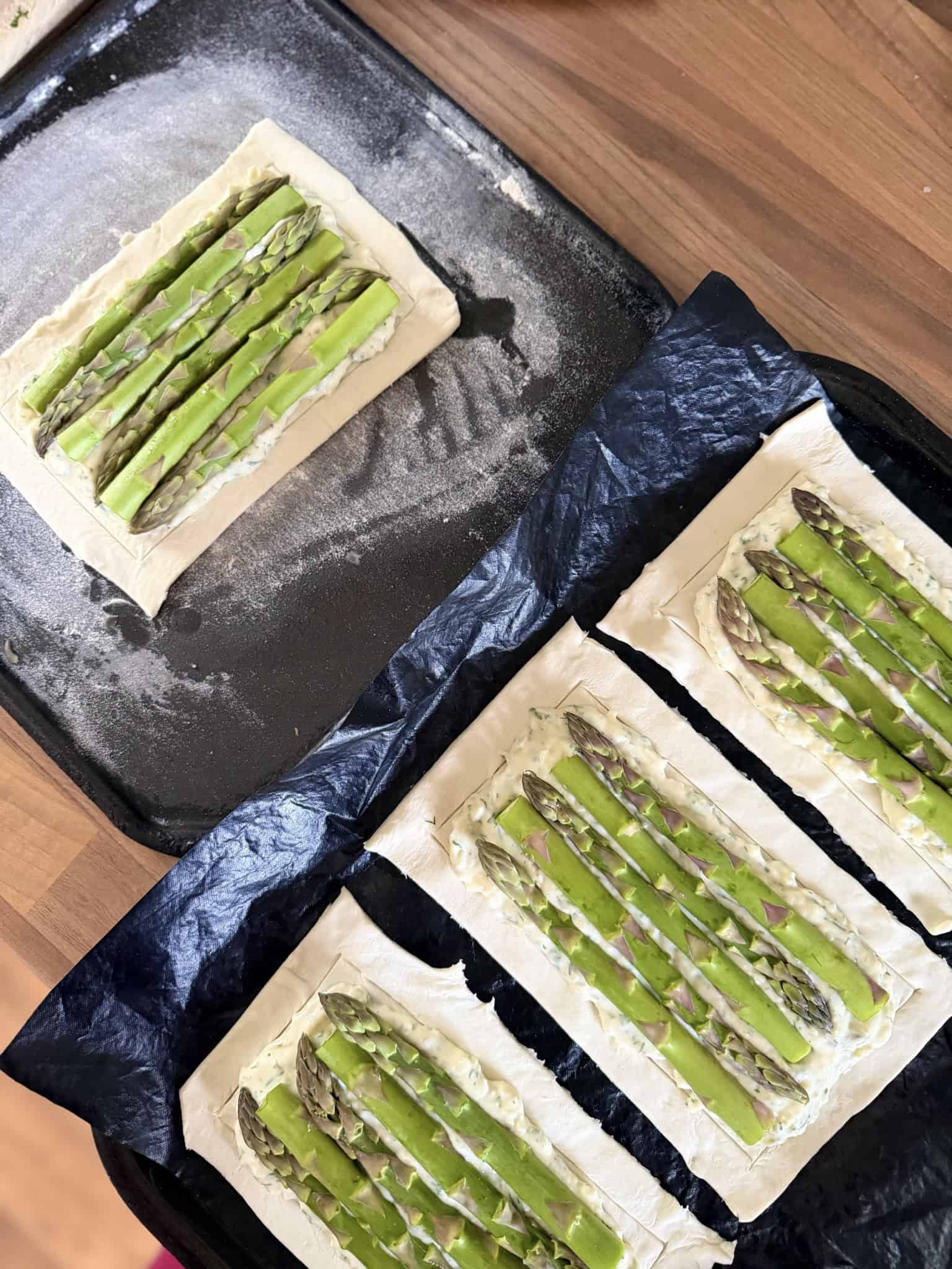 cheese and asparagus on raw puff pastry tart