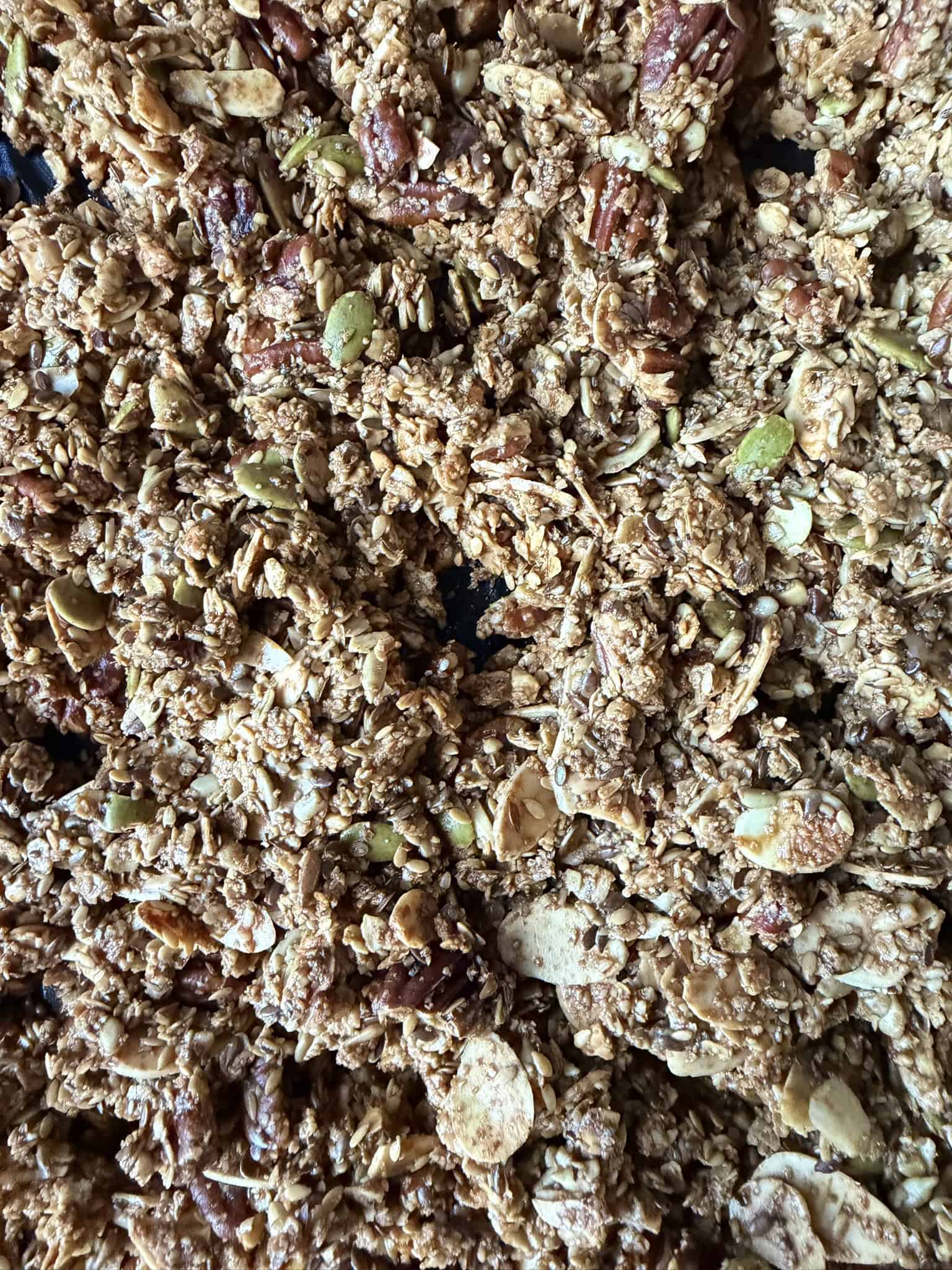 baked granola on a  tray