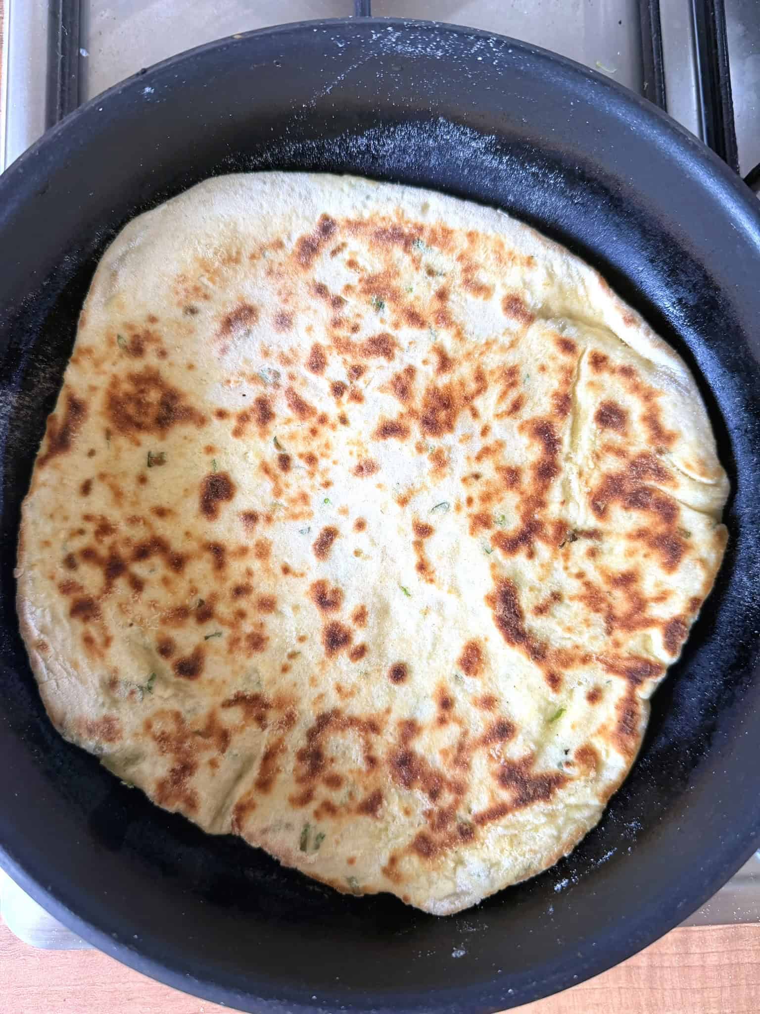 cooking flatbreads with frying pan