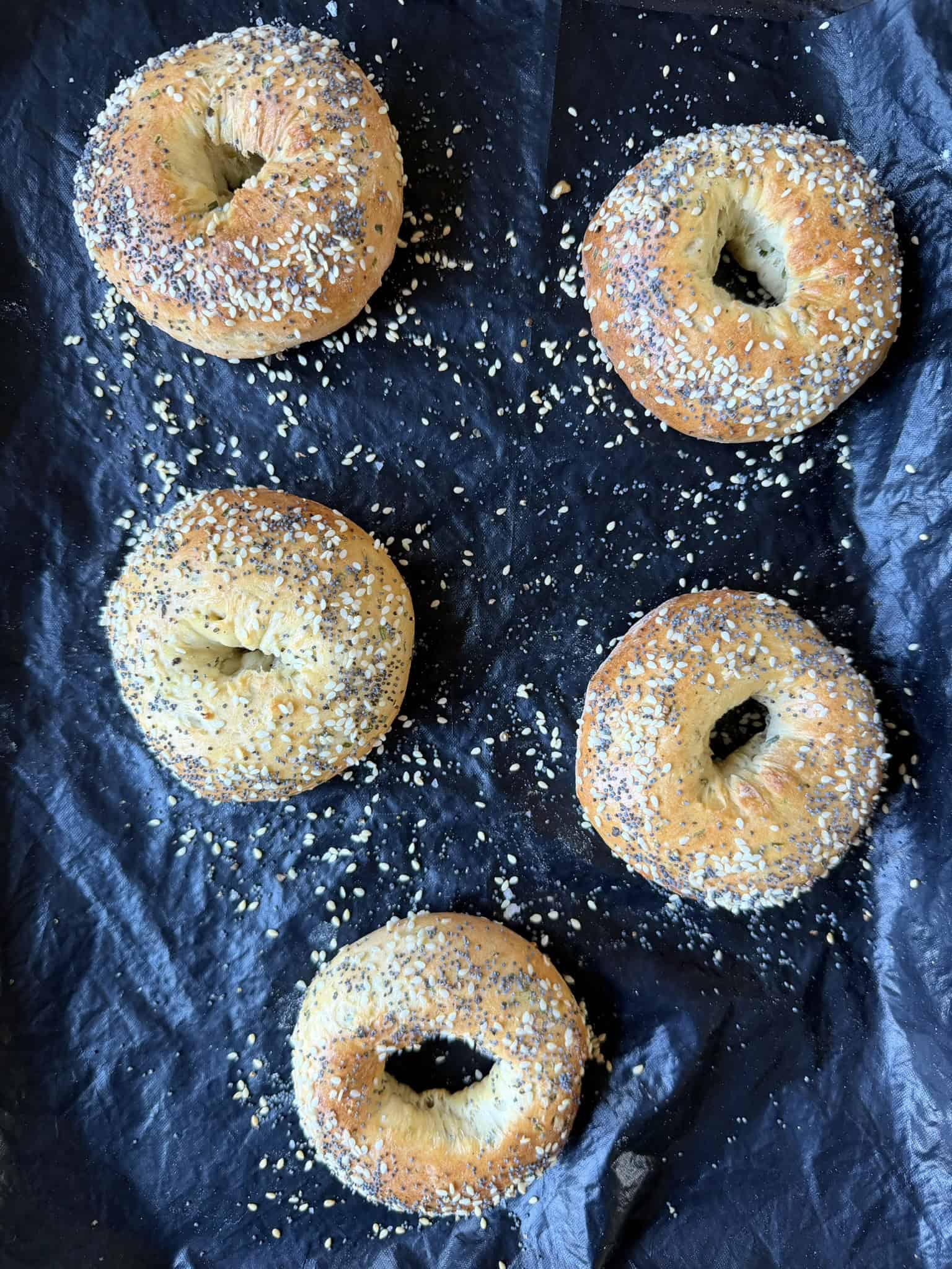 cooked bagels on a tray