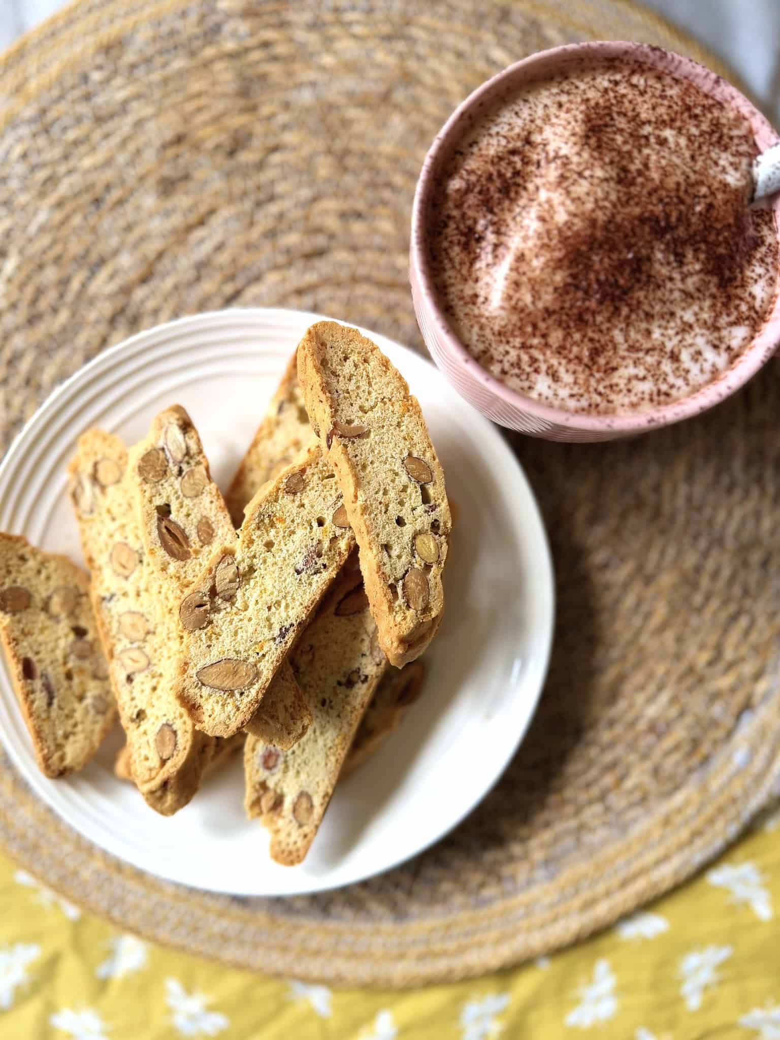 biscotti next to cup of coffee