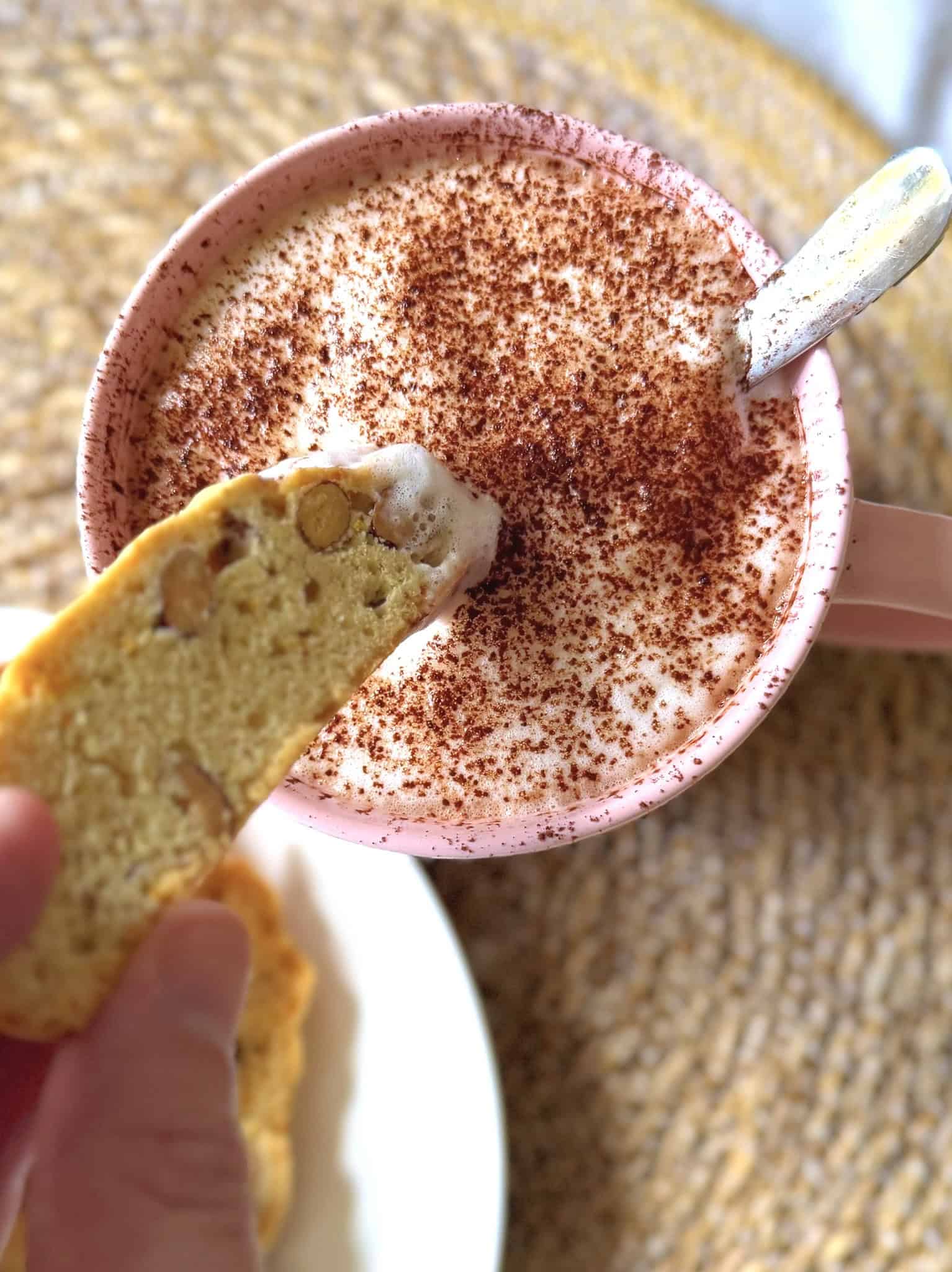 dipping biscotti into coffee