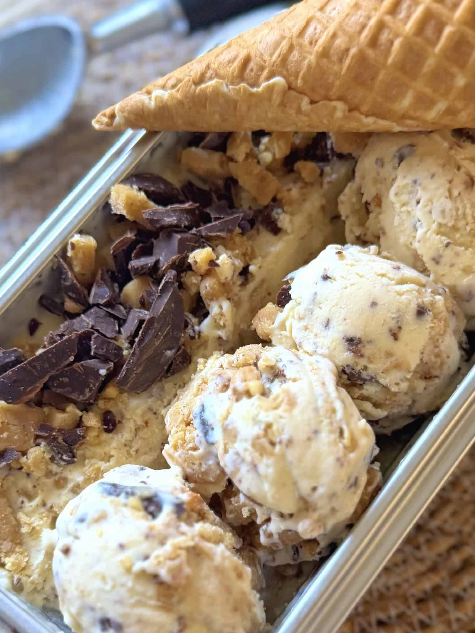 close up scooped ice cream in tin