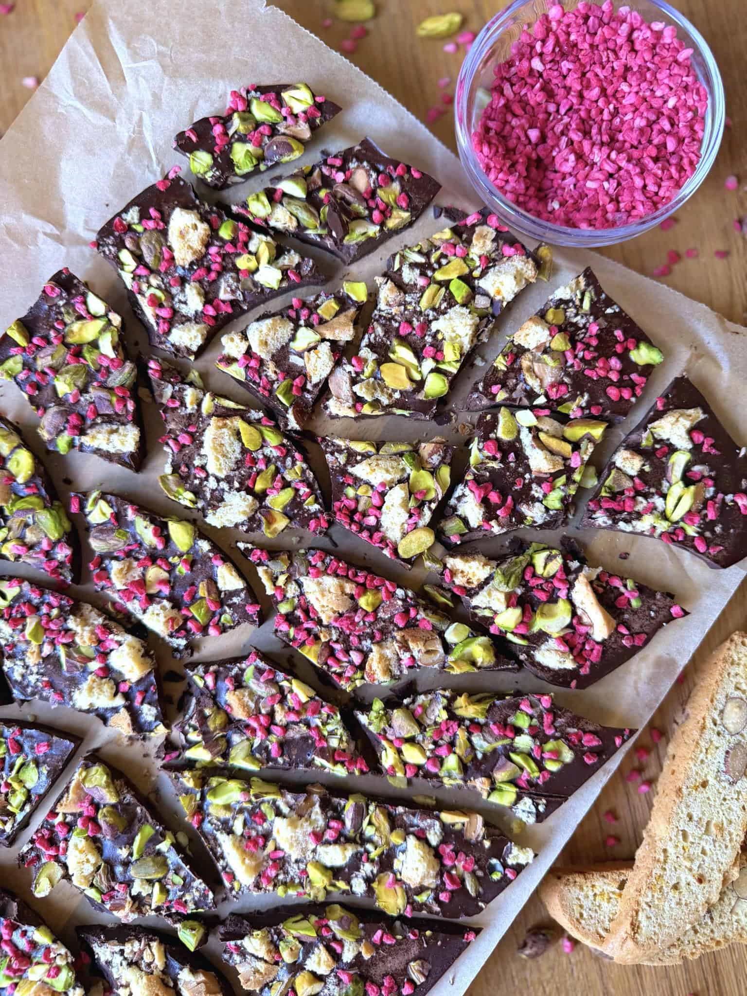 Healthy homemade chocolate with pink freeze dried raspberries