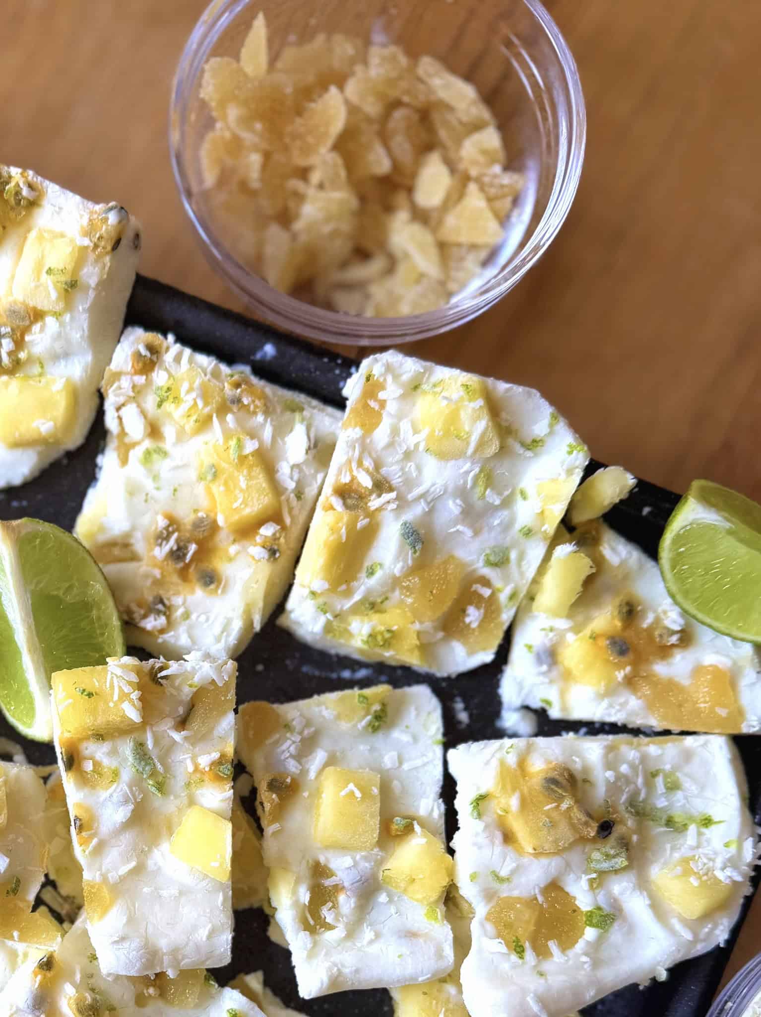 Tropical greek yogurt bark pieces on a tray