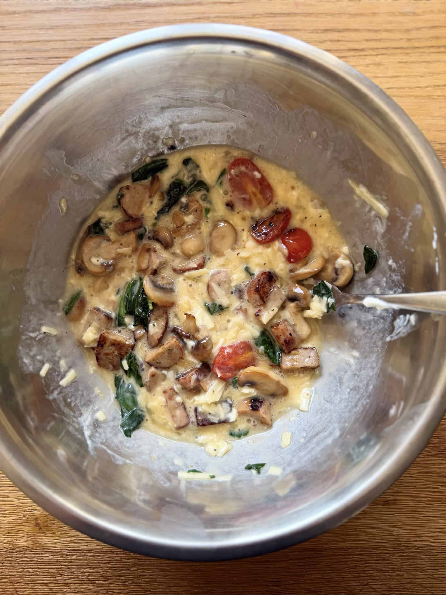 stir in vegetables into egg
