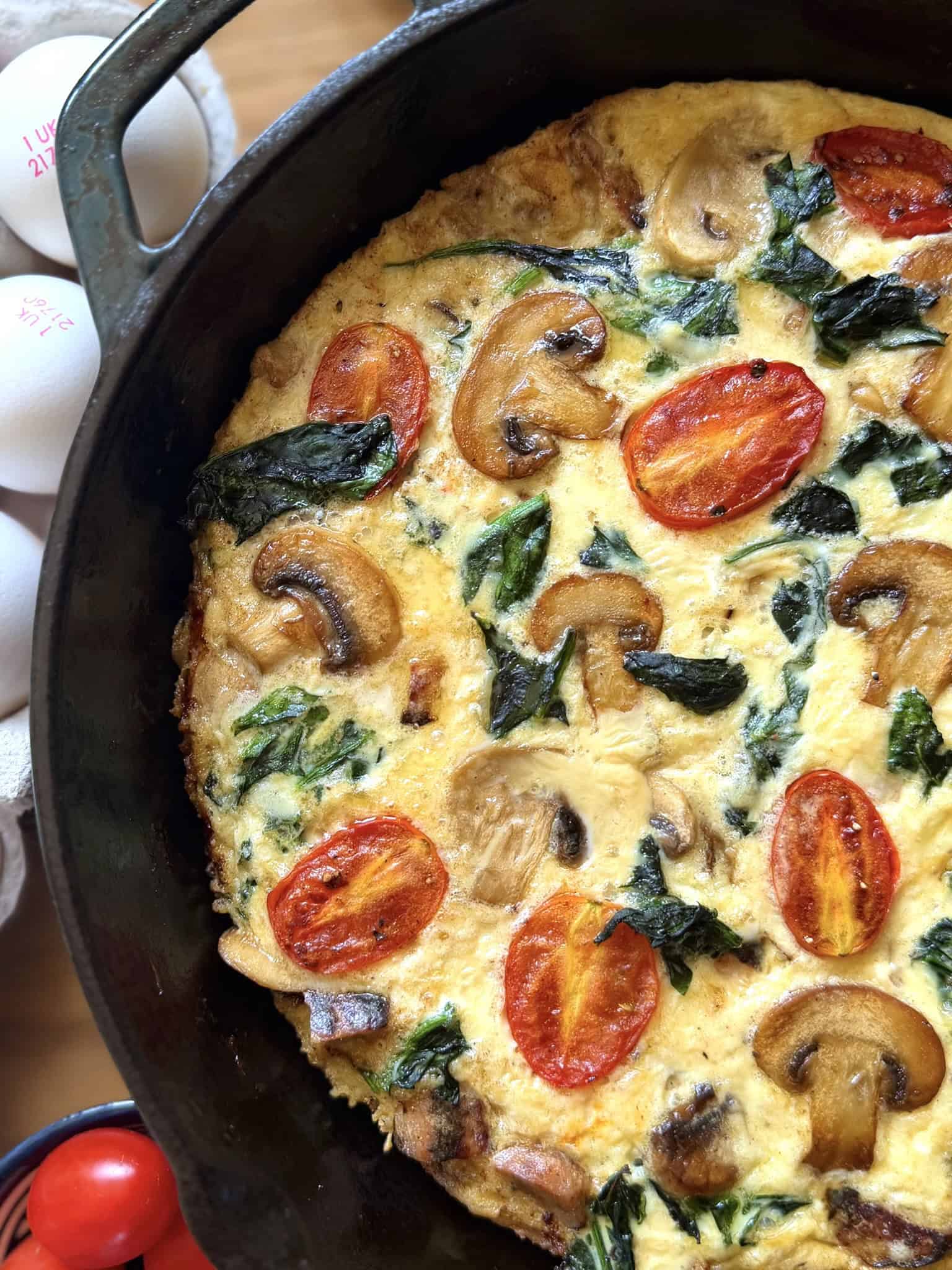 breakfast frittata in a black skillet