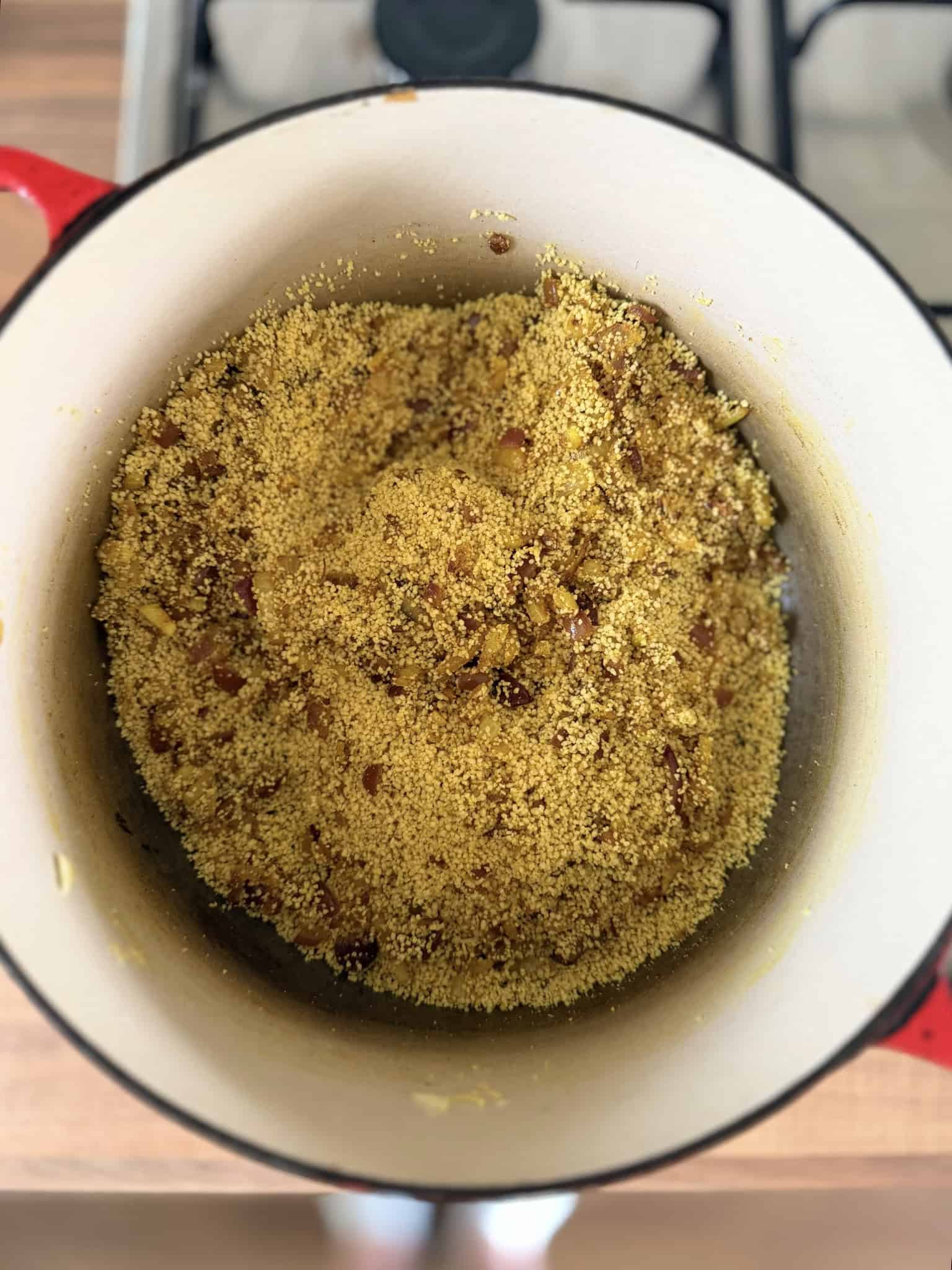 Add couscous to pan