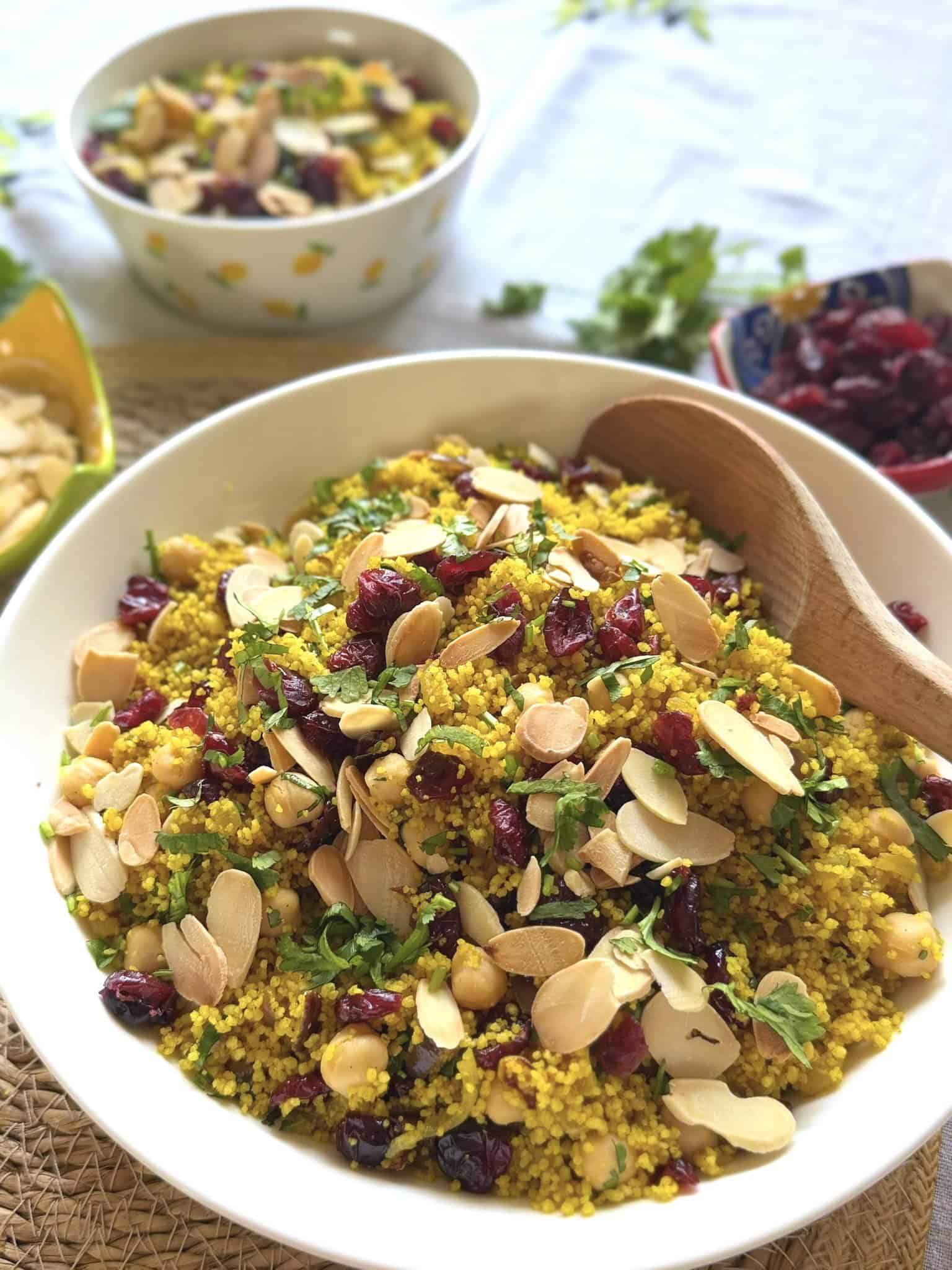 couscous salad with dried cranberries an flaked almonds
