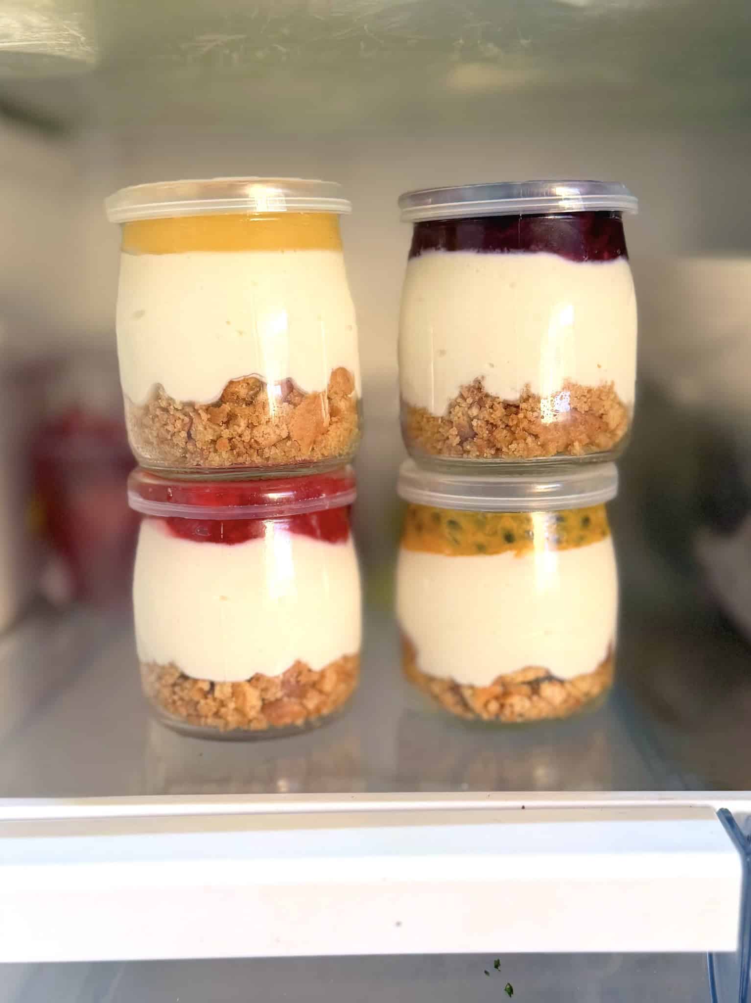 Mini cheesecakes in jars in the fridge