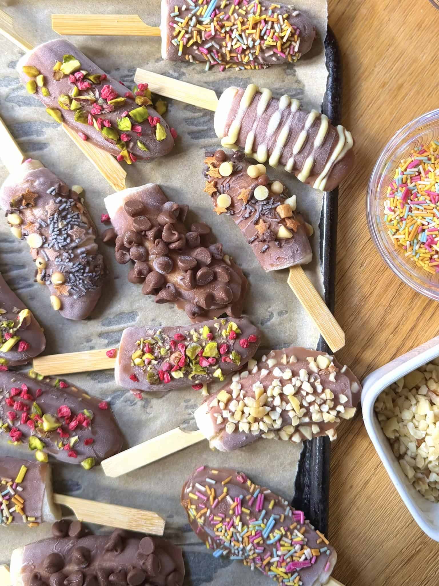 chocolate bananas with assorted toppings
