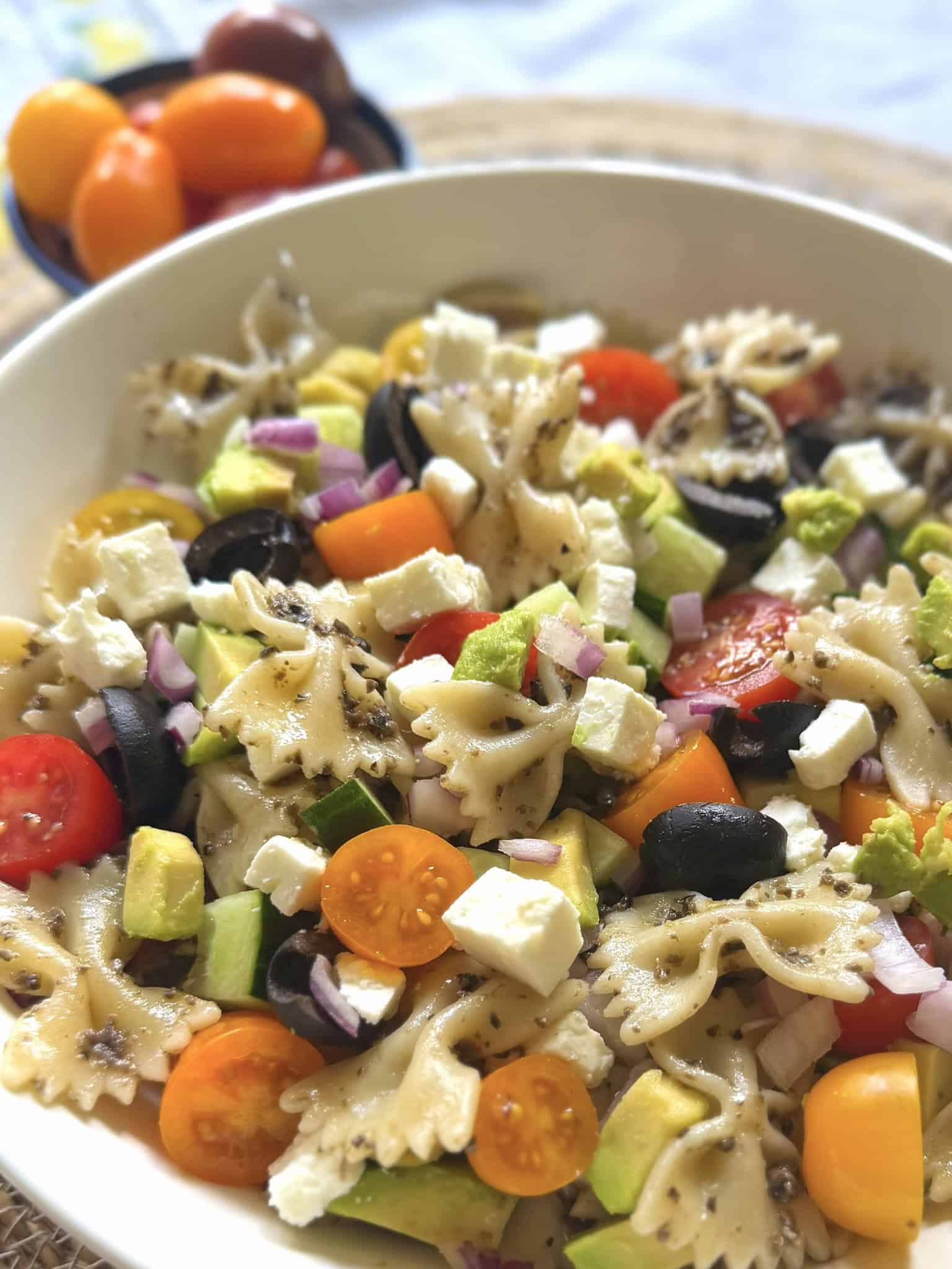 pasta salad in a white bowl