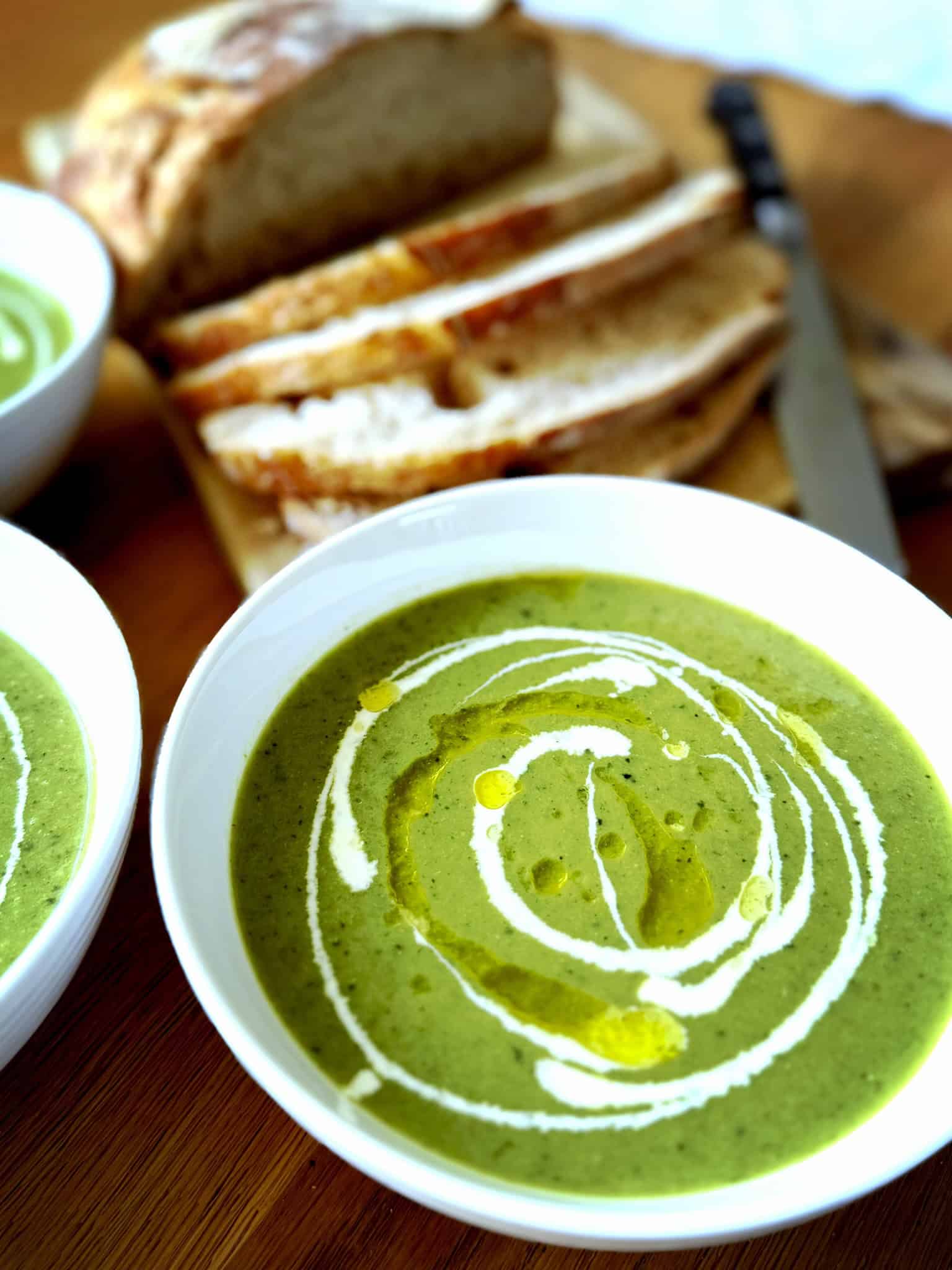 green soup with sour dough bread